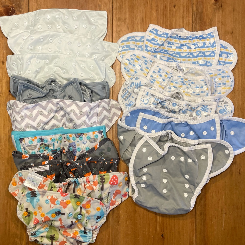 Lot of 13 adjustable snap diaper covers